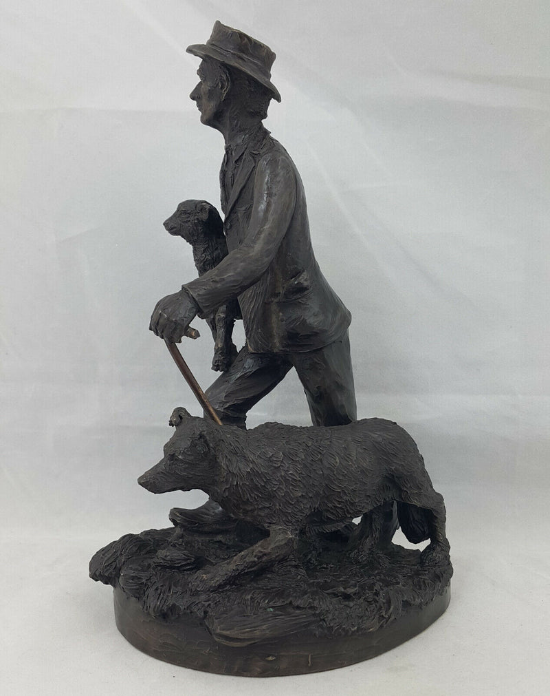 Bronze Shepherd Carrying Baby Sheep & Walking Dog