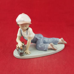 Lladro Figurine 7619 - All Aboard Boy Playing with Train - 7568 L/N