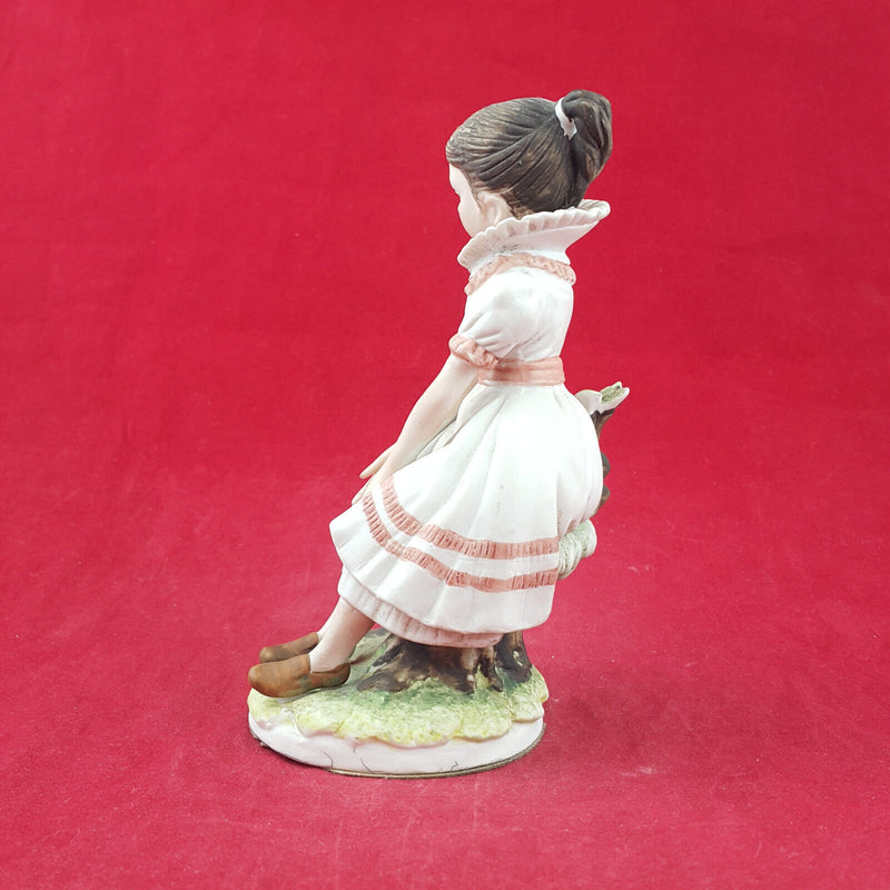 Lefton Porcelain Figurine - Girl Sitting On A Tree Trunk KW844 - TF 117