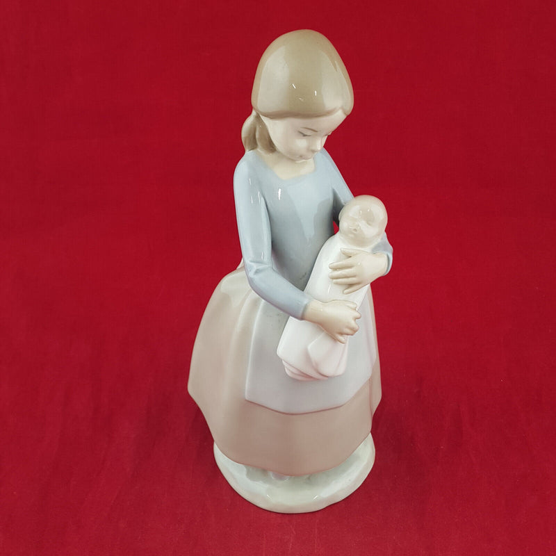 RETIRED LLADRO NAO FIGURINE Girl With Doll baby carriage Excellent  Condition! - Figurines, Facebook Marketplace