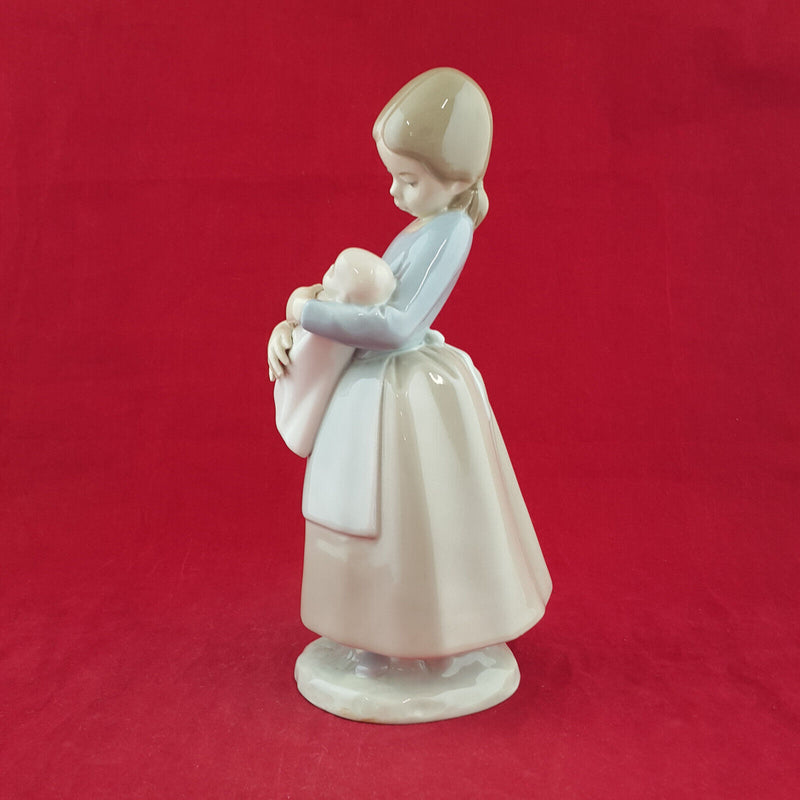 Lladro Nao - Girl Holding Baby Doll - L/N 1422