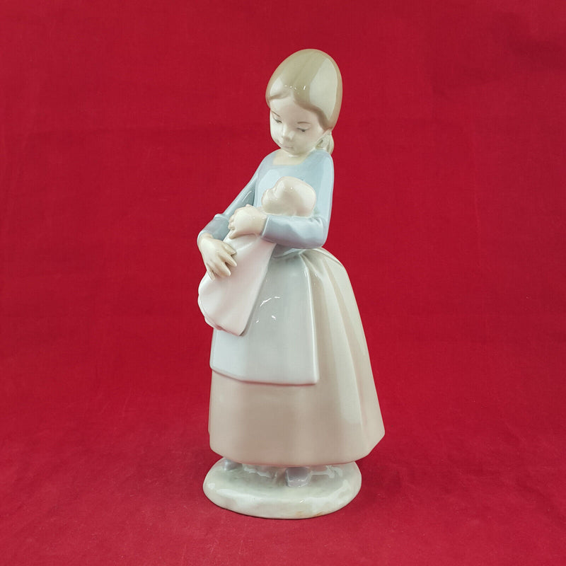 Lladro Nao - Girl Holding Baby Doll - L/N 1422